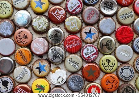 London, Uk - July 13, 2019: Mixed Beer And Non Alcoholic Beverages Metal Bottle Caps In London Uk.