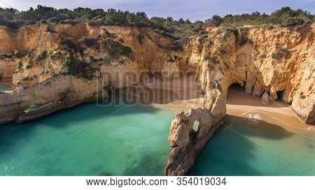 Aerial View Of Cliffs Blue Sea Water Beach Boiao, Portimao Portugal