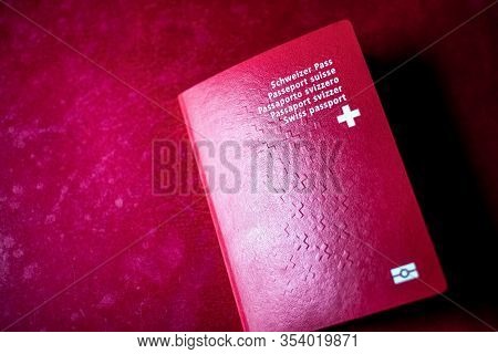swiss passport on red background