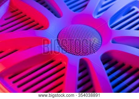 Colorful Lights Of Car Stereo And Car Speakers Background.  Car Music Audio Speaker In Blue And Pink
