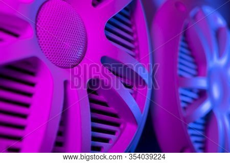 Colorful Lights Of Car Stereo And Car Speakers Background.  Car Music Audio Speaker In Blue And Pink