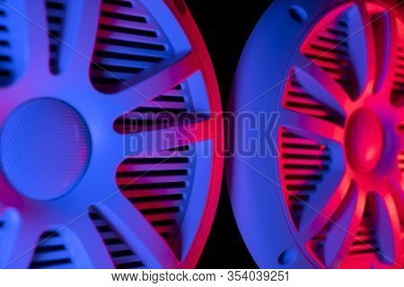 Colorful Lights Of Car Stereo And Car Speakers Background.  Car Music Audio Speaker In Blue And Pink