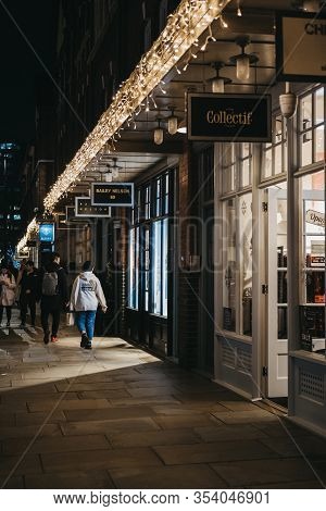 London, Uk - December 14, 2019: People Walking Past The Shops And Cafes In Spitalfields Market, One 