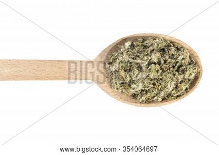 Dried Artichoke Leaves Or In Latin Cynarae Folium In Wooden Spoon Isolated On White Background. Medi