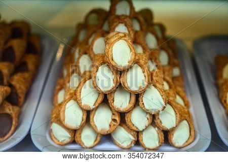 Sweet Italian Desssert, Pile Of Cannoli Pastry Filled With Ricotta Cream Cheese Close Up