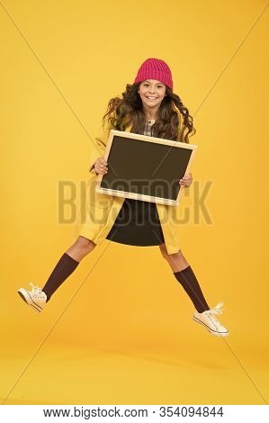 Copy Space For Ad. Happy Pupil Kid Jumping. Back To School. Desire For Study. Smiling Child Jump. Re