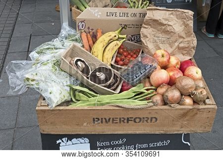 Bristol, Uk - April 28, 2017: A Box Of Fruit And Vegetables From Riverford Organic Farmers On Displa