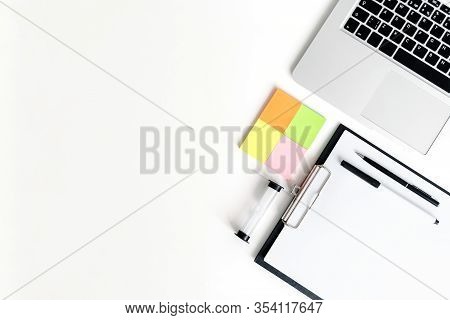 Coaching Business Tools Like Hourglass, Notebok, Pens And Tablet On A White Wooden Background. Flat 