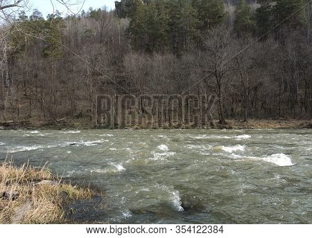 Boiling Water Of A Mountain Fast River In The Mountains In Spring, Big Stones. Nature Landscape Scen