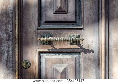 Old Wooden Vintage Door With Handle And Lock Retro Background Close Up