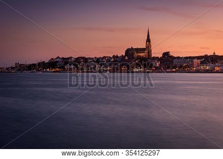 Lysekil / Sweden : July 23 2019 Sunset At Lysekil In Western Sweden With Lysekil Kyrka (church) Illu