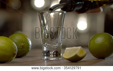 Bartender Pouring Tequila