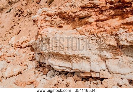Black Sea Red Rocks Coastline. Cape Chersonesos Wild Beach In Sevastopol, Russia.