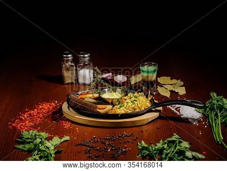 Fried Potato And Bavarian Sausage.german Food Concept