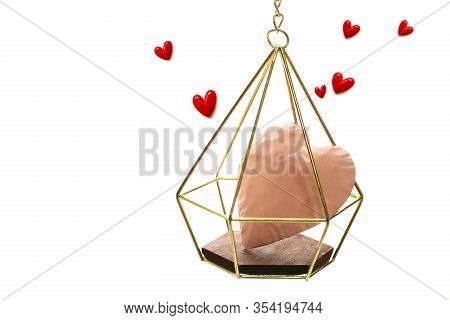 The Big Pink Heart Enter The Gold Cage Red Small Hearts Fly Upwind On White Background And Copy Spac