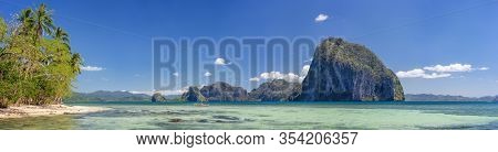 Impressive Pinagbuyutan Island, Ocean Bay And Background Mountains. El Nido Panorama Of Palawan, Phi