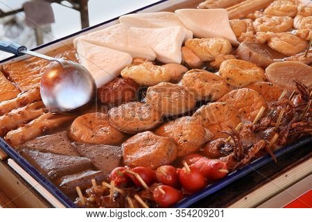 Japanese Cuisine - Oden Food In Soy Broth. Typical  Winter Food In Japan With Sausages, Dumplings, T