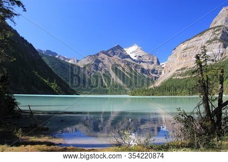 Beautiful Reflection Of Mount Robson In The Lake. Jasper National Park, Canadian Rockies, Canada