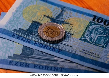A Close-up Shot Of Hungarian National Currency (forint) Banknotes And A 100 Forint Coin