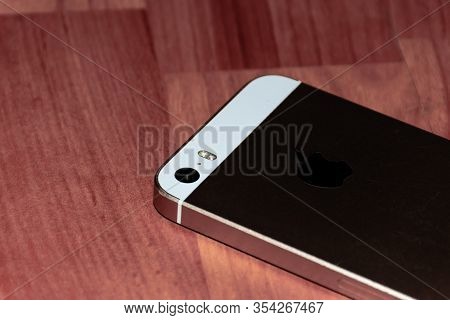 Puget-theniers, France - February 25, 2020: A Rose Gold Iphone Se Smartphone On The Table Screen Dow