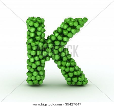 Letter k, from scattered green fresh apples