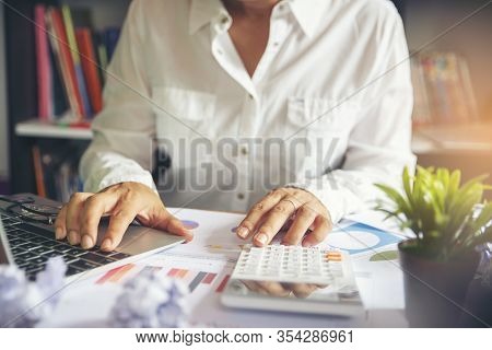 Business And Finance Planning Concept.financial Adviser Planning And Working On Laptop,professional 