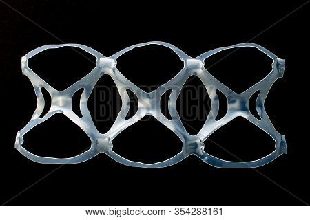 Isolated Six Pack Rings Or Six Pack Yokes, Connected Plastic Rings Used In Multi-packs Of Beverage O