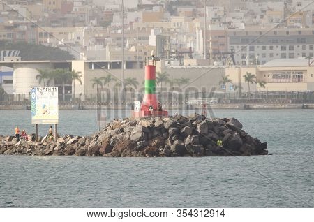 Breakwater With A Small Lighthouse. Port Of Las Palmas Or La Luz Port. Las Palmas De Gran Canaria. G