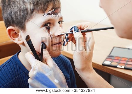 Little Cute Child Making Facepaint On Birthday Party, Zombie Apocalypse Facepainting, Halloween Prep