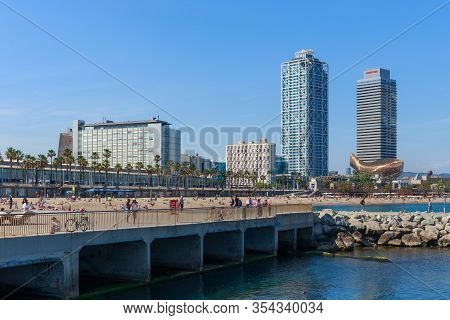 Barcelona, Spain - May 15, 2017: View Of The City Beach In Barcelona On The Mediterranean Sea. With 