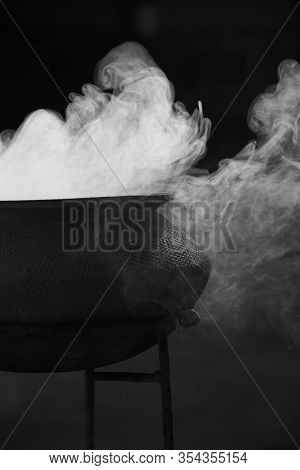 The Smoke Of The Incense Burner In Black And White