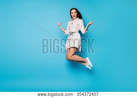 Full Length Profile Photo Of Funny Lady Jump High Rejoicing Celebrate Summer Weekend Vacation Beginn