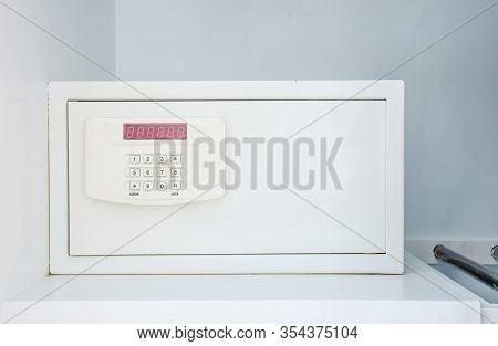 Safe Box With Electronic Lock In The Hotel Or Home, Safety Box Or Modern Electronic Locker. Close-up