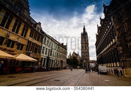 Ghent, Belgium, August 2019. The Imposing Bell Tower Called Beffroi, With Its Grandeur Stands Out Co