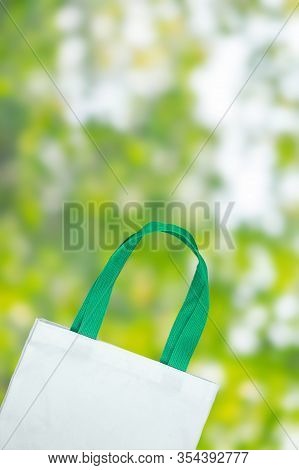 Eco Shopping Bag On Green Nature Background With Copy Space For Text. Environmental Protection, Zero