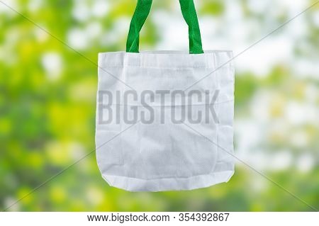 Eco Shopping Bag On Green Nature Background With Copy Space For Text. Environmental Protection, Zero