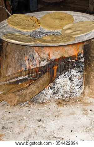 Making Tortillas Over A Wood Fire In El Fuerte, Sierra Madre Occidental, Sinaloa State - Mexico
