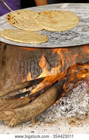 Making Tortillas Over A Wood Fire In El Fuerte, Sierra Madre Occidental, Sinaloa State - Mexico