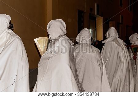 Puget-theniers, France - February 26, 2020: The Traditional Annual Parade Of White Penitents