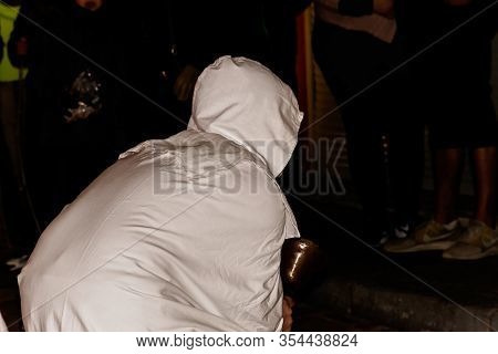 Puget-theniers, France - February 26, 2020: A Participant Ringing A Bell During The Traditional Annu