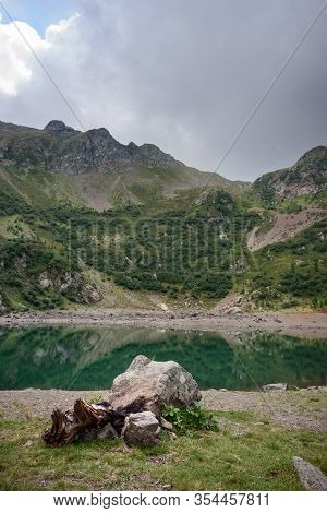 View Of An Alpine Glacier Lake Over The Top Of Italian Alps. A Secret Place Of Dolomites. Italy