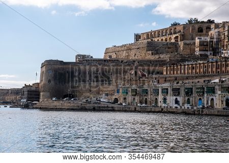 Valleta Malta- 8 February 2020:  Ancient Harbour Of Valetta With Upper Barakka Gardens In Background
