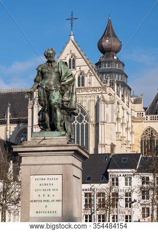 Antwerp, Belgium - February 6, 2020: Statue Of Petro Paulo Rubens With The Cathedral Of Antwerp In T