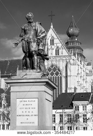 Antwerp, Belgium - February 6, 2020: Statue Of Petro Paulo Rubens With The Cathedral Of Antwerp In T
