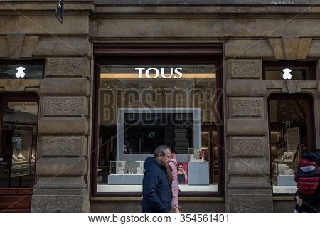 Prague, Czechia - November 1, 2019: Tous Logo In Front Of A Showcase Showing Its Main Creations, Nec
