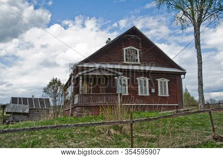 Tver Region, Russia - May 9, 2014: View Of An Old Wooden House In The Village