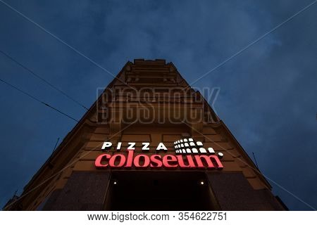 Prague, Czechia - November 2, 2019:  Pizza Coloseum Logo In Front Of Their Restaurant In Prague. Piz