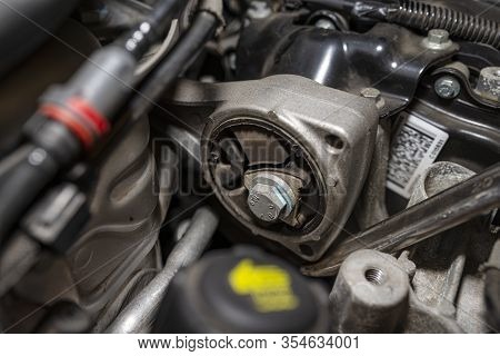 Turbocharger In A Used Car With A Diesel Engine Visible Engine Compartment Covered With Aluminum Foi