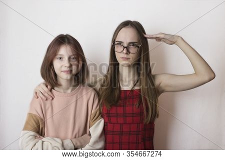 Stepsisters Or Friends Children Teens Not Like Each Other On A White Background