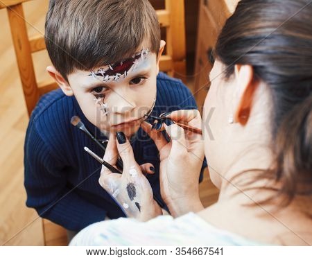 Little Cute Child Making Facepaint On Birthday Party, Zombie Apocalypse Facepainting, Halloween Prep